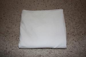 neatly folded fitted sheet